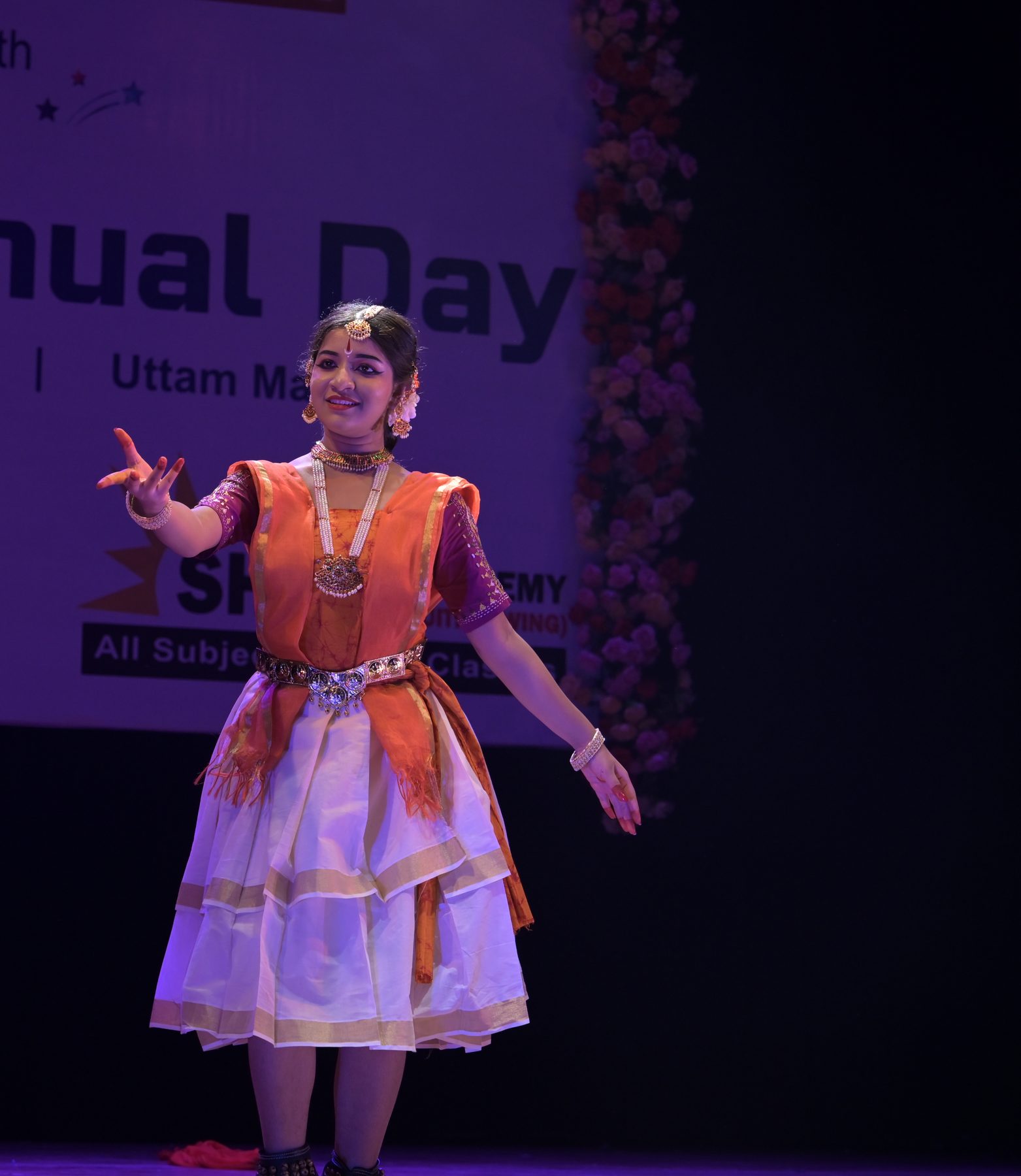 Rabindranritya dancer reaching a hand forward mid-expression